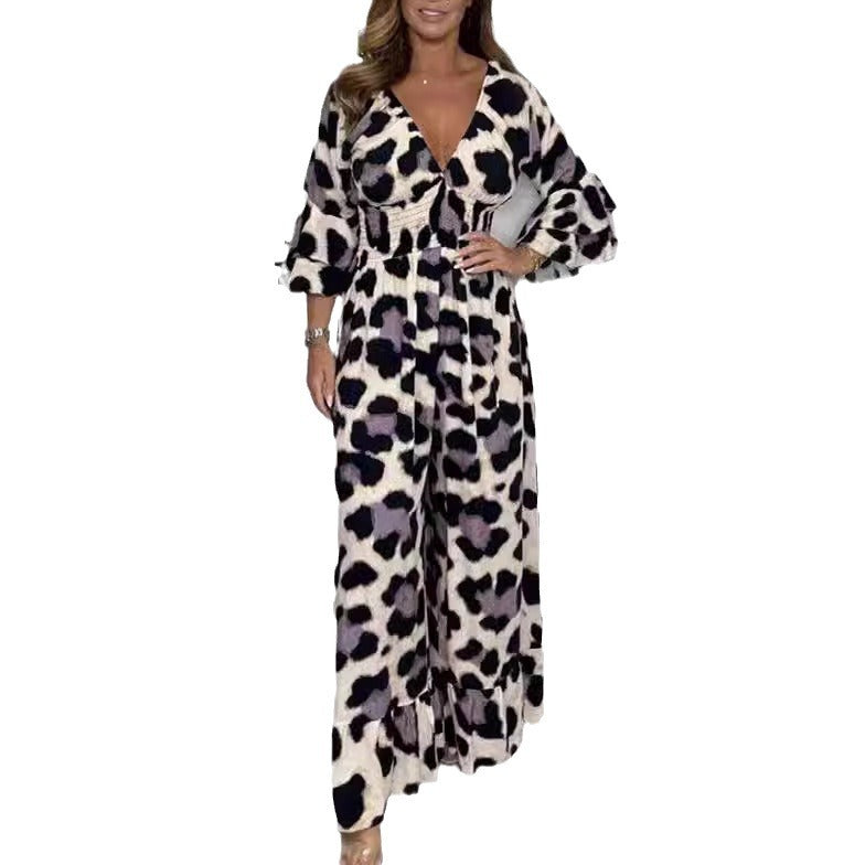 Dame Maxijumpsuit med elegant V-udskæring og flæseærmer Stilla