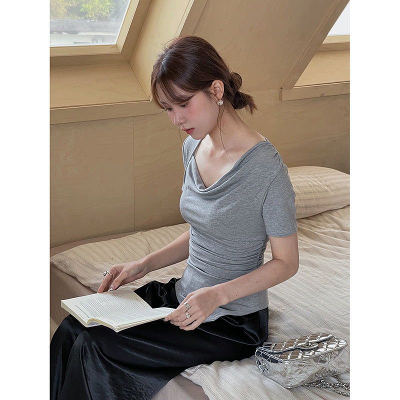 Dame elegant indpakningsoberstykke med asymmetrisk nederdel og fine folder Stilla