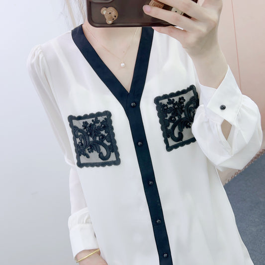 Dame elegant bluse med kunstneriske broderier og V-udskæring Stilla