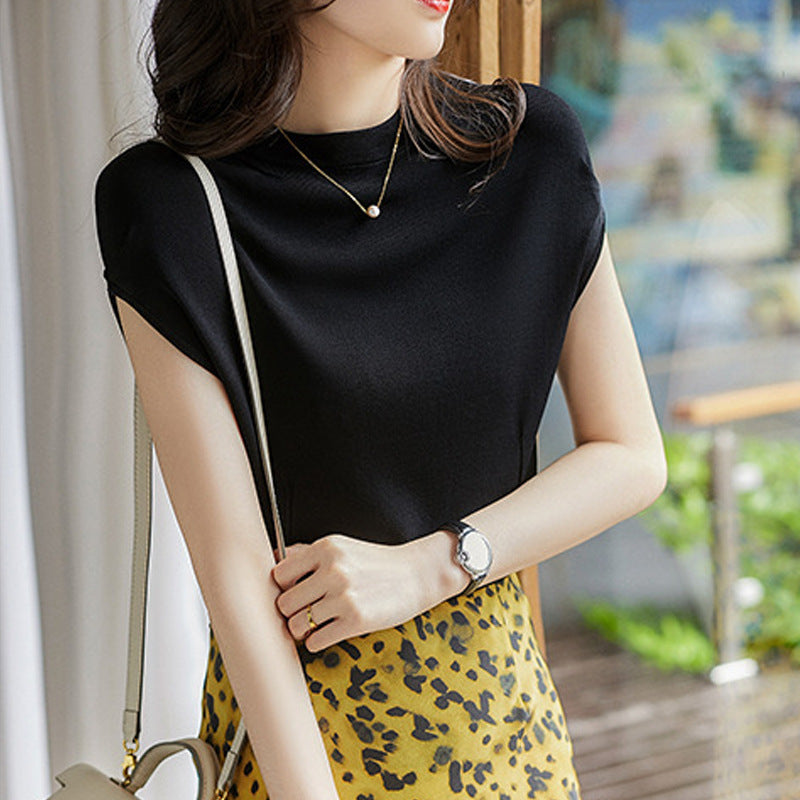 Dame elegant højhalset top med korte ærmer og fin struktur Stilla