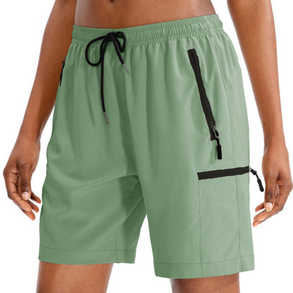 Dame Sporty Shorts med innovative sidelommer Stilla