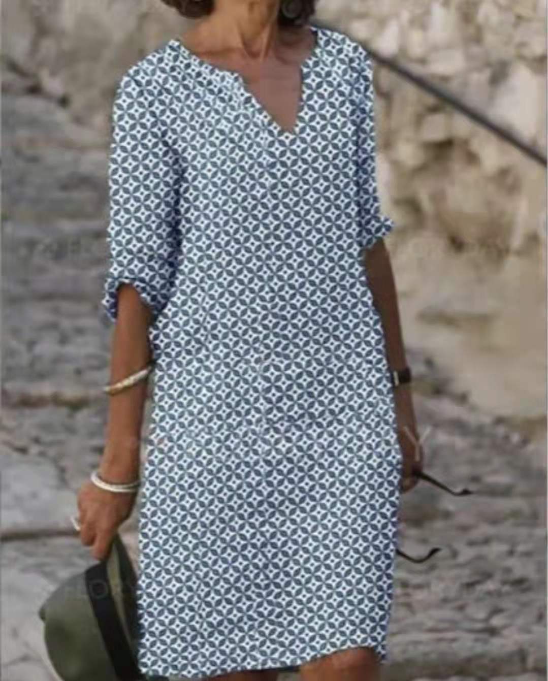 Dame afslappet skjortekjole med blomstermotiv og praktiske sidelommer Stilla