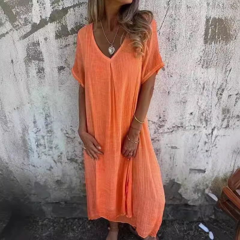 Dame afslappet maxikjole i let materiale med V-hals og overdimensionerede ærmer Stilla