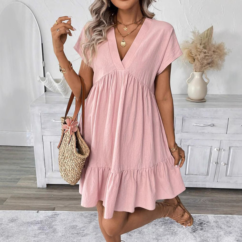 Dame afslappet sommerkjole med V-udskæring og voluminøs bund Stilla