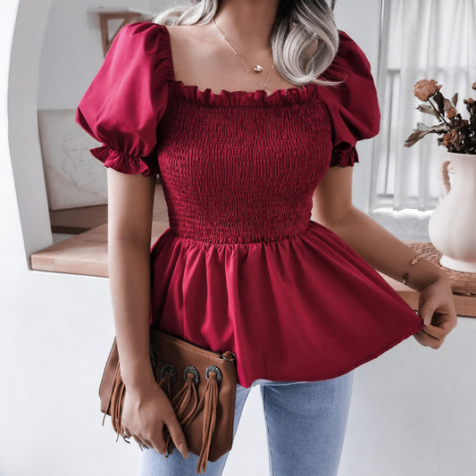 Dame puffærme bluse med flæsedetaljer og elastisk bund Stilla