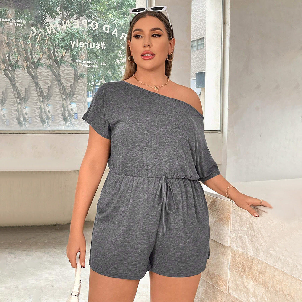 Dame afslappet jumpsuit med justerbar talje og asymmetrisk udskæring Stilla