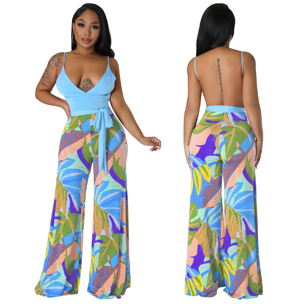 Dame Jumpsuit med flydende snit og elegant taljering Stilla