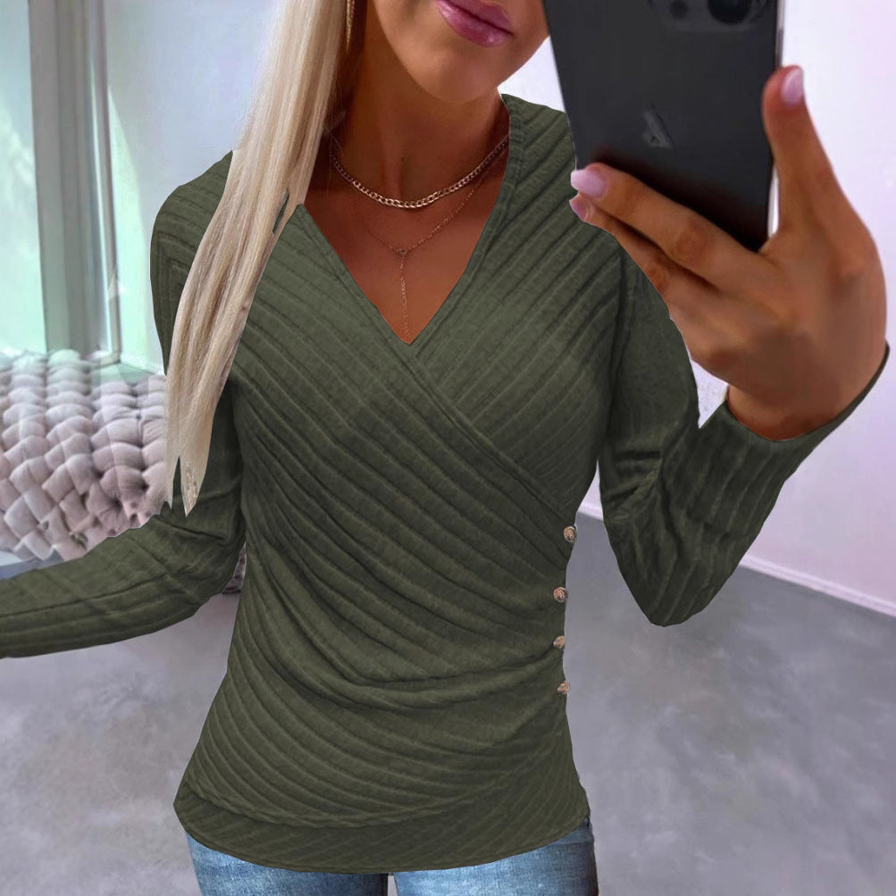 Dame elegant indpakningstop med struktureret design og dekorative knapper Stilla