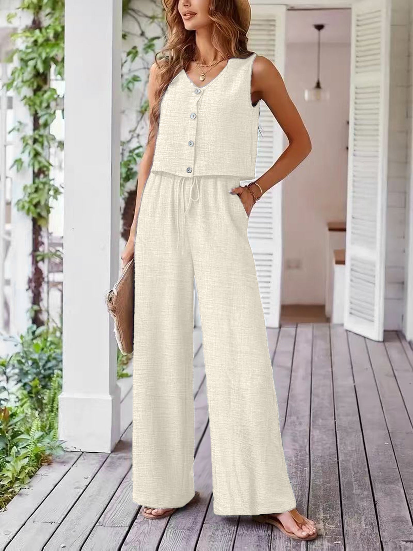 Dame leger jumpsuit med knaplukning og bredt ben Stilla