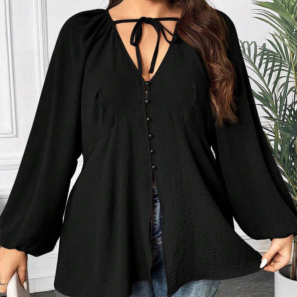 Dame elegant bluse med V-udskæring og dekorative knapdetaljer Stilla