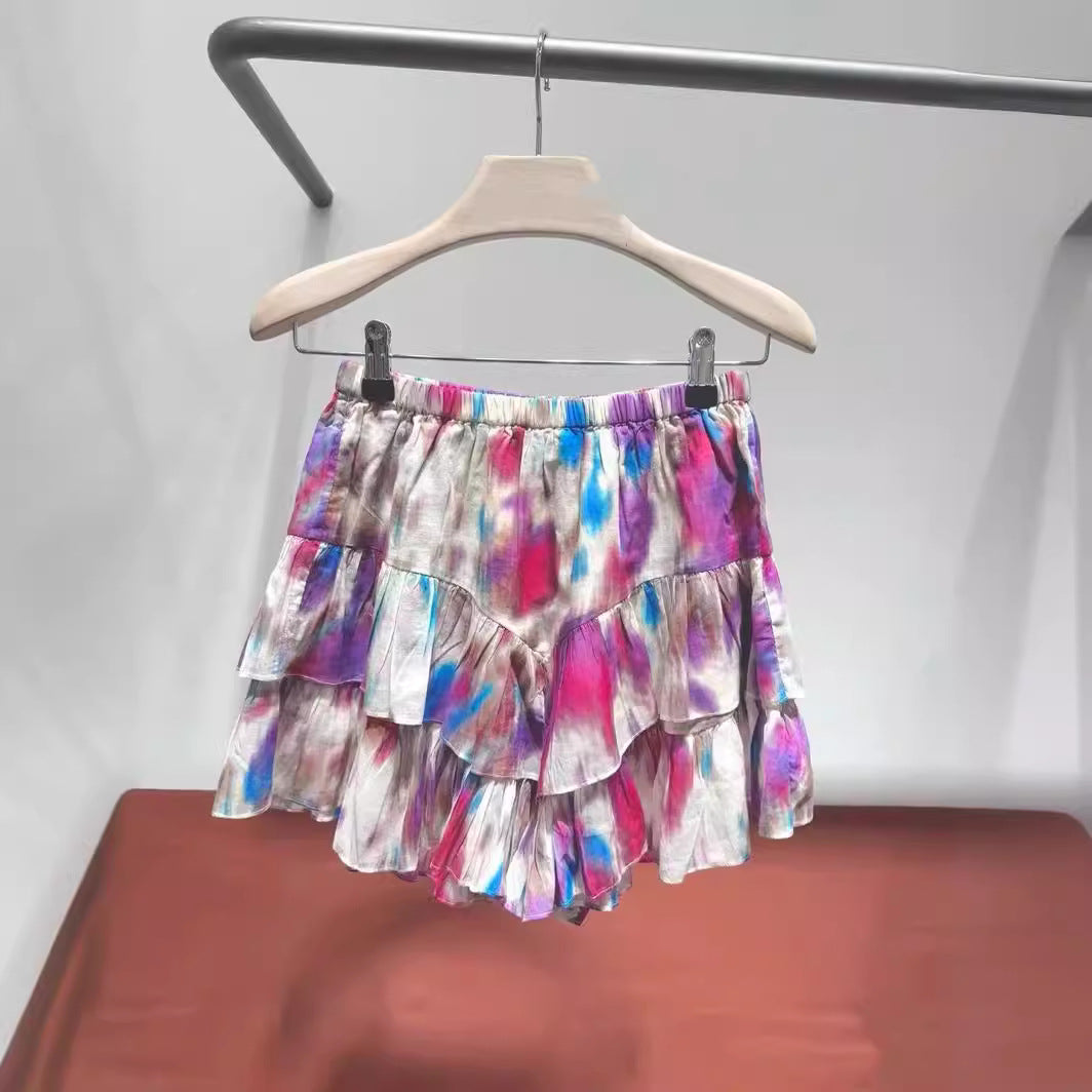 Dame afslappet bluse med uregelmæssigt mønster og dekorative knapdetaljer Stilla