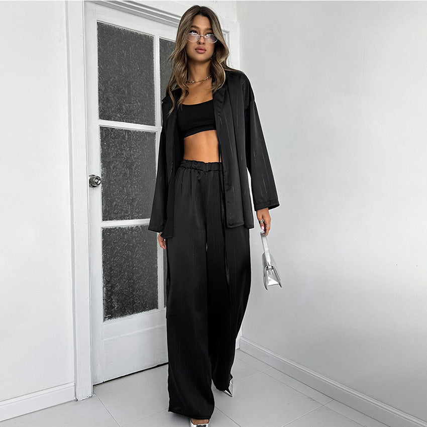 Dame jumpsuit med dyb V-udskæring og løs pasform Stilla