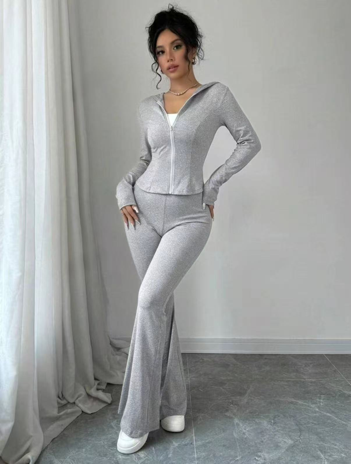 Dame Sporty Jumpsuit i elastisk materiale med lynlås Stilla
