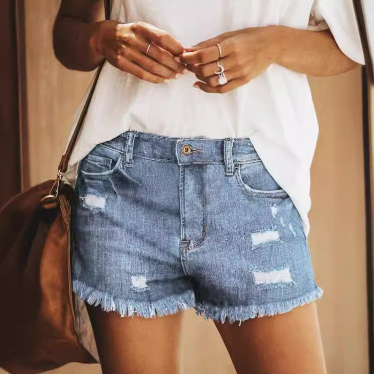Dame Destroyed Denim-Shorts med afslappet frynseafslutning Stilla