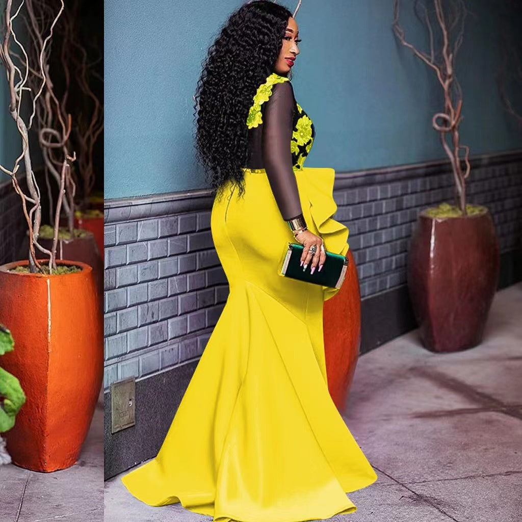 Dame Elegant aftenkjole med gennemsigtige ærmer og ruffle-detalje Stilla