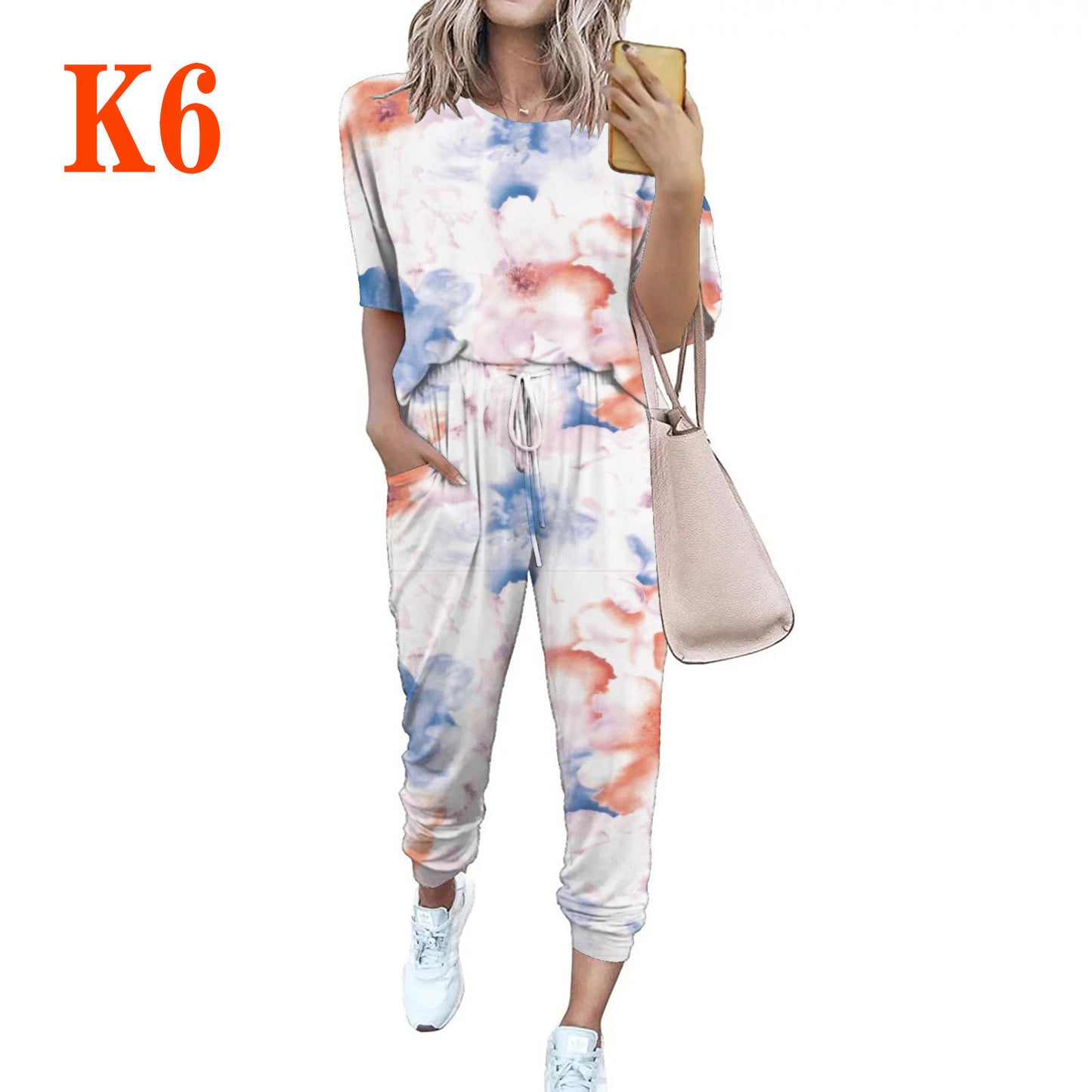 Dame afslappet jumpsuit med blomsterprint og elastisk bånd Stilla