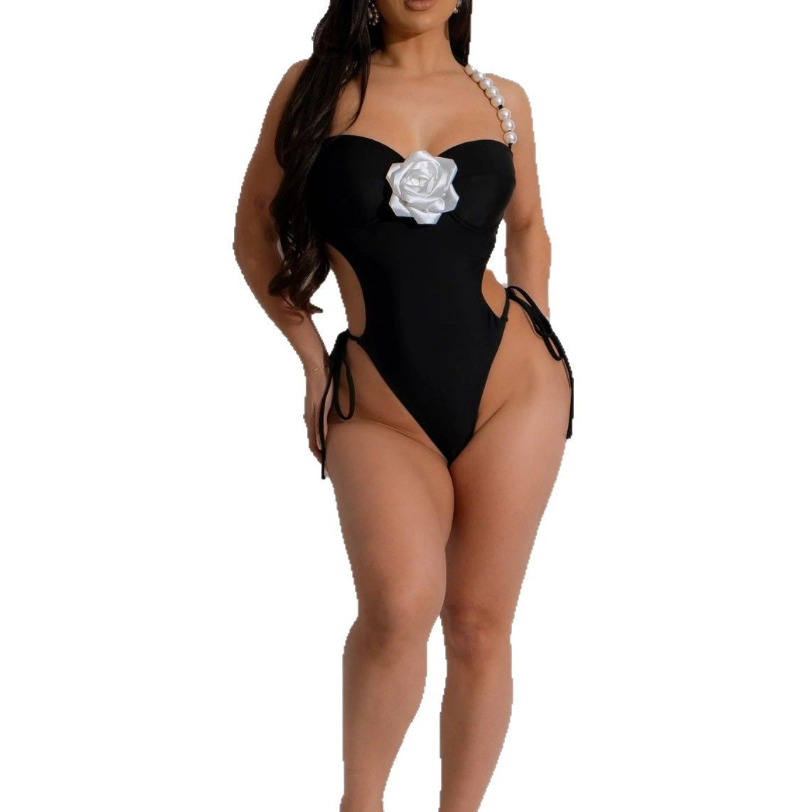Dame elegant badedragt med blomsterdetalje og åbne sider Stilla
