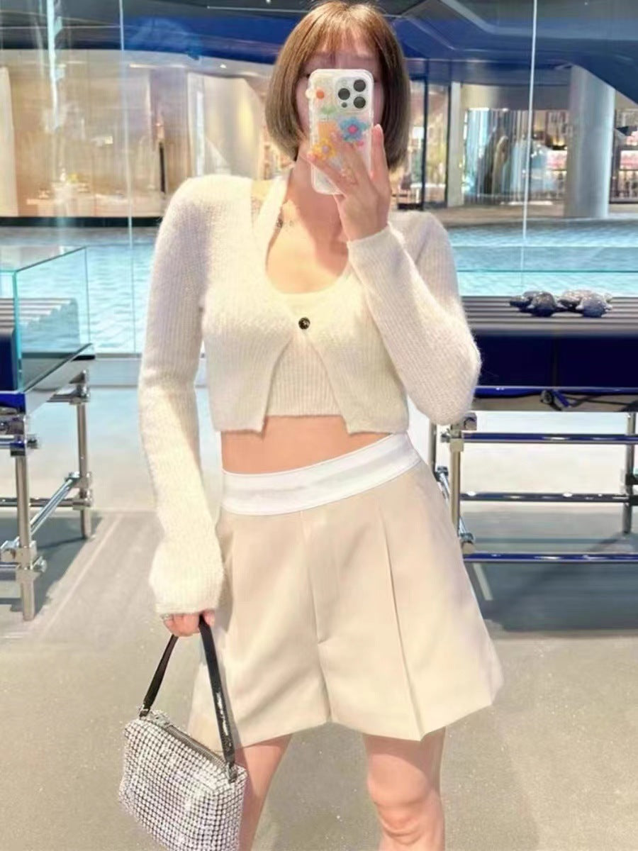 Dame cropped strikjakke med elegant knapdetalje Stilla