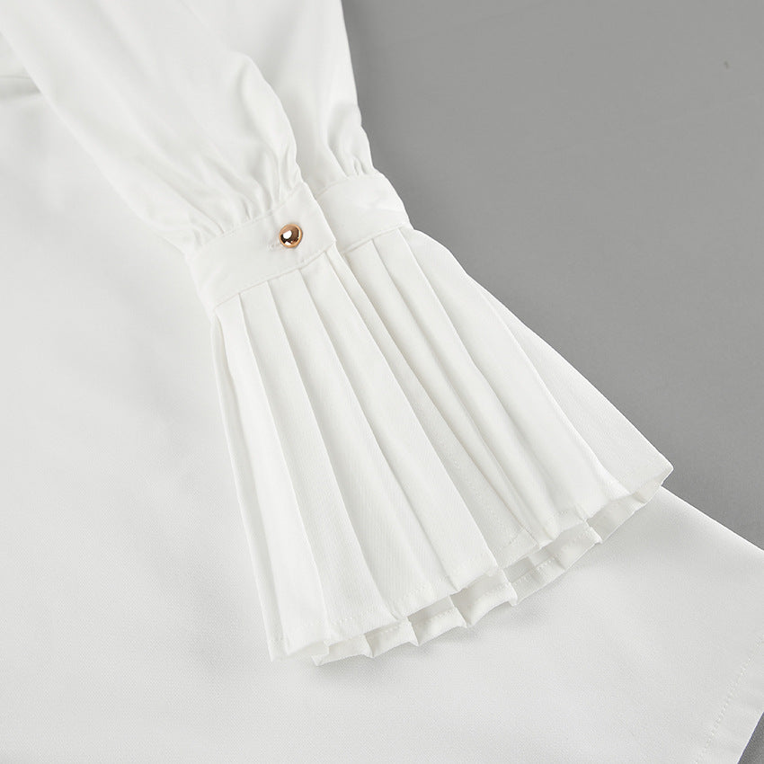 Dame elegant Bluse med plisserede ærmer og knaplukning Stilla