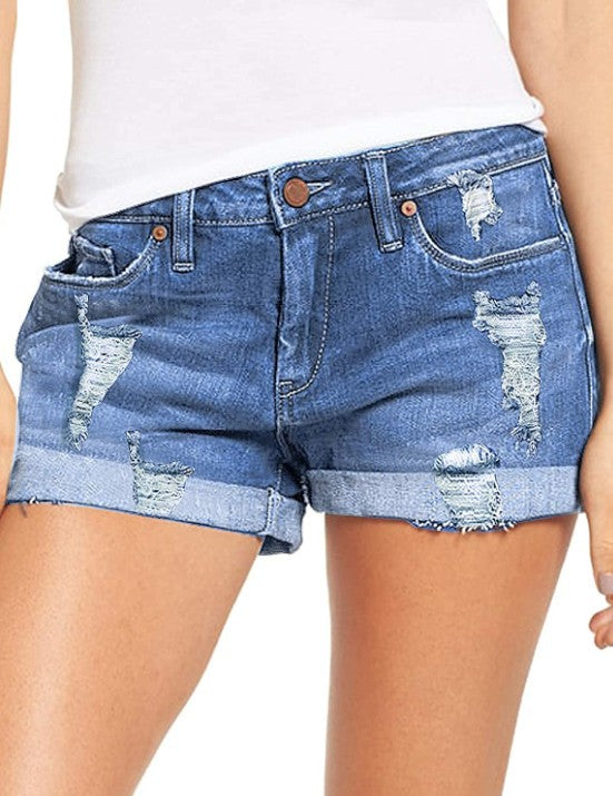 Dame Destroyed Denim-Shorts med omfoldet kant og trendy dekorationer Stilla