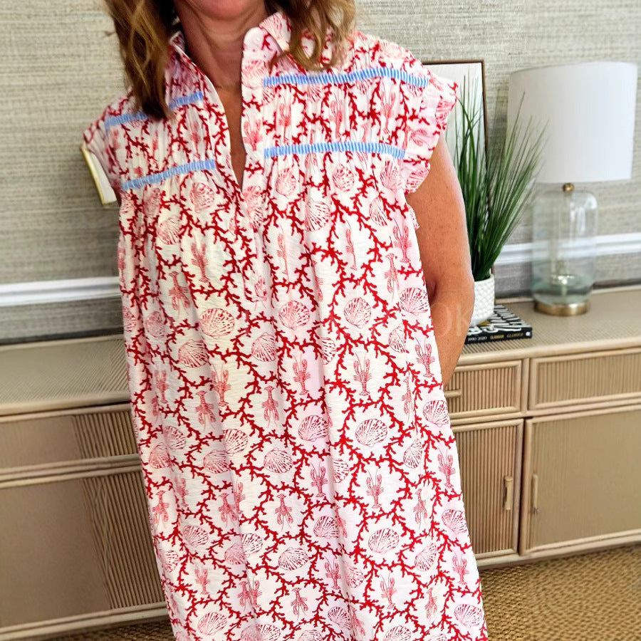 Dame afslappet strandkjole med blomsterdesign og knapfrit design Stilla