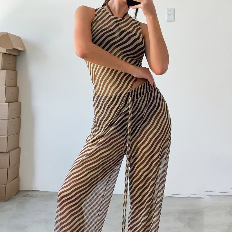 Dame stilfuld jumpsuit med asymmetrisk snit og stribemønster Stilla