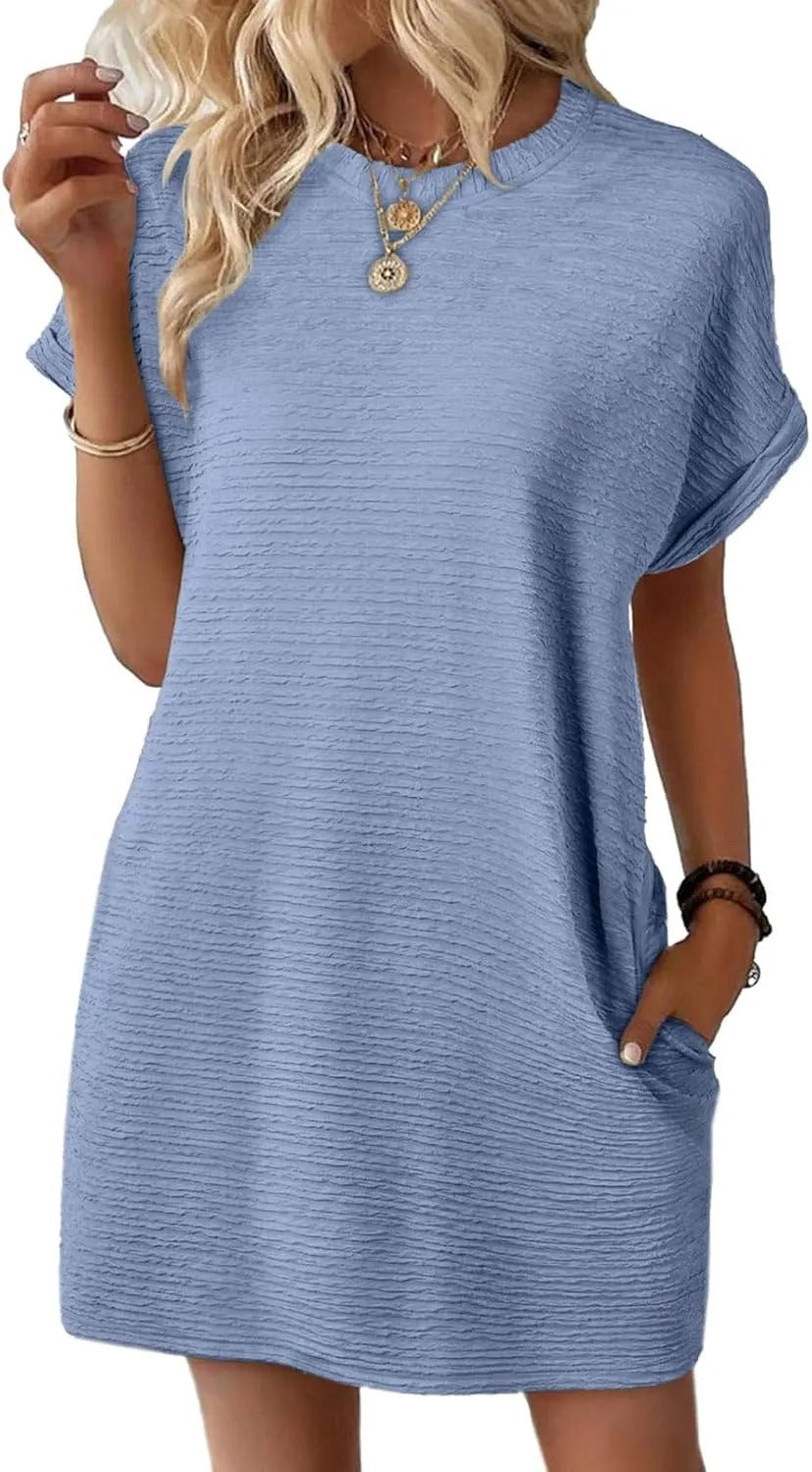 Dame afslappet kortærmet kjole med indvævet teksturmønster og praktiske lommer Stilla