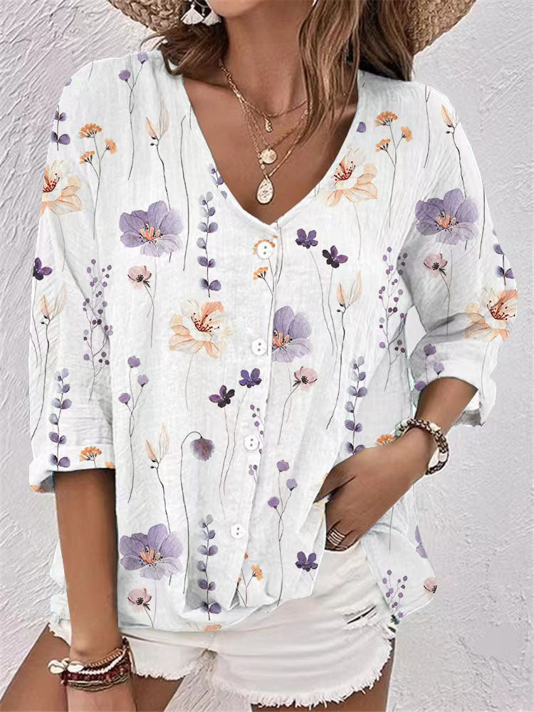 Damebluse med blomstertryk og halve ærmer Stilla