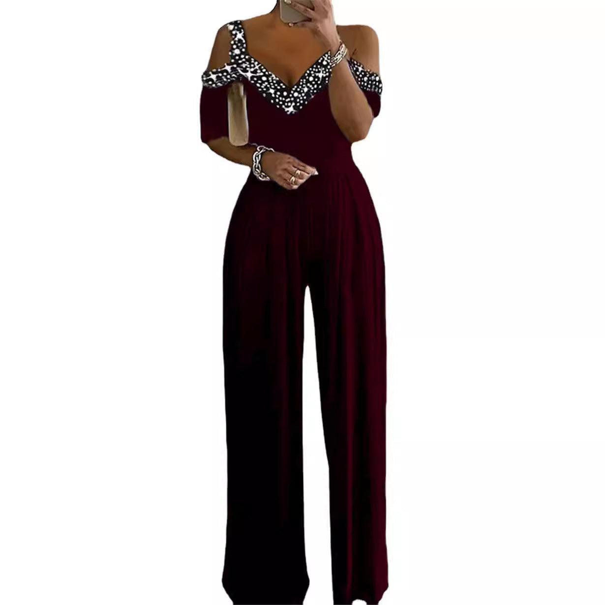 Dame Elegante Jumpsuit med Off-Shoulder Design og Glitteraccenter Stilla