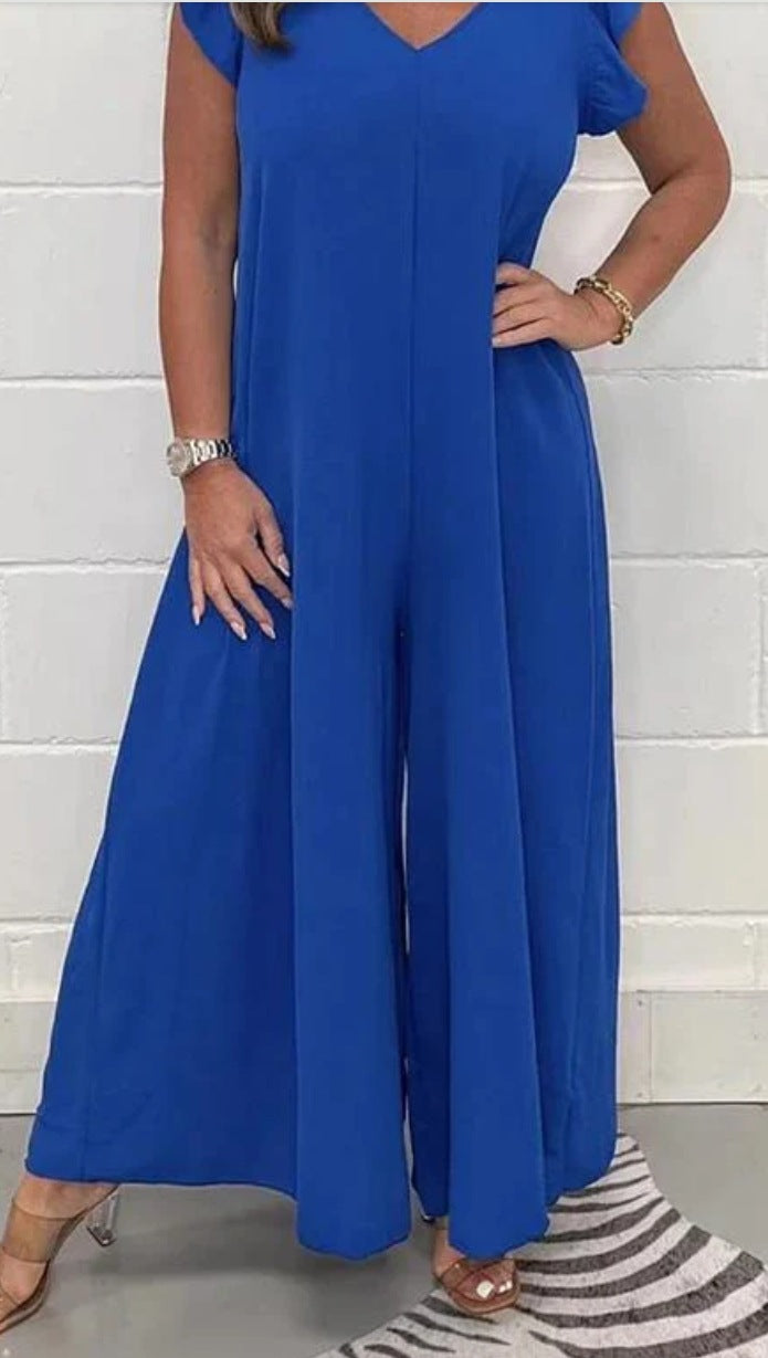 Dame jumpsuit med voluminøse ben og elegant V-udskæring Stilla