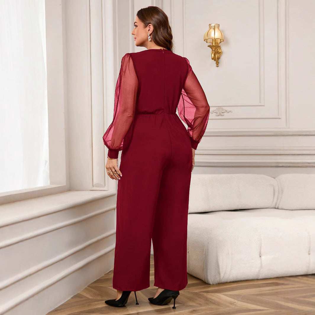 Dame elegant jumpsuit med transparente ærmer og talje bælte Stilla
