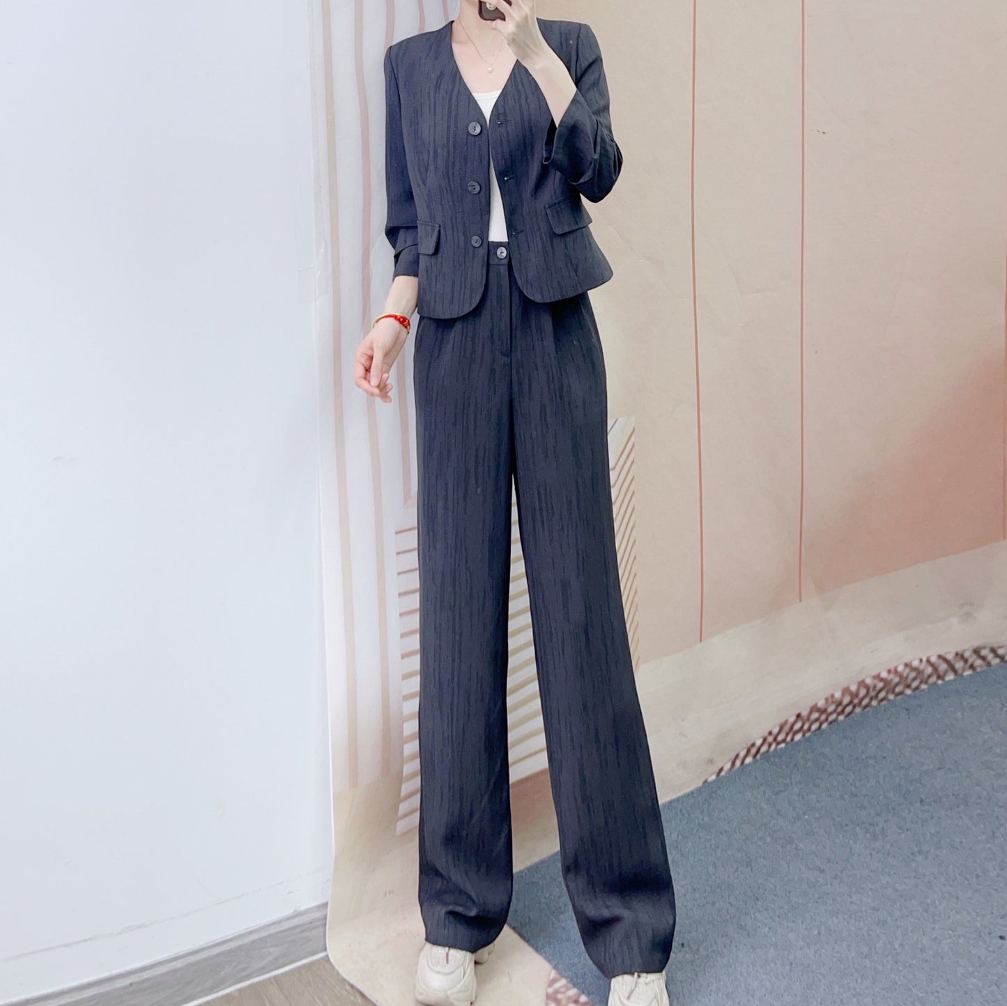 Dame elegant blazer-bukser sæt med smal pasform og dekorative knapdetaljer Stilla