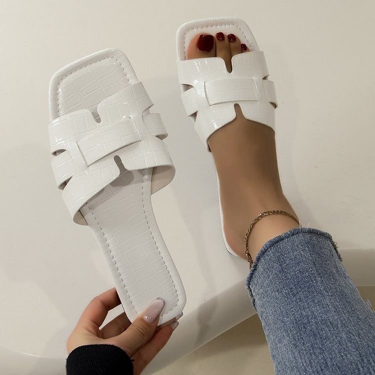 Dame åbne mules med moderne rem-design og komfortabelt fodbedd Stilla