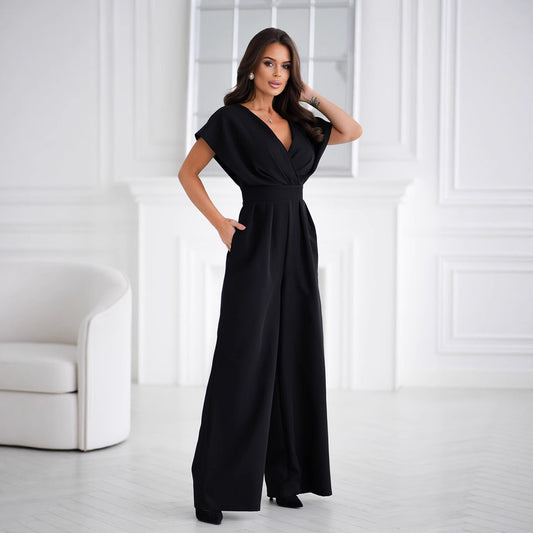 Dame jumpsuit med elegant V-udskæring og vidde ben Stilla