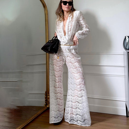 Dame jumpsuit af elegantspitze med flydende snit og bredt ben Stilla