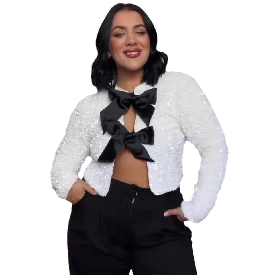 Dame cropped blazer med elegant perleudsmykning og stort sløjfedetalje Stilla