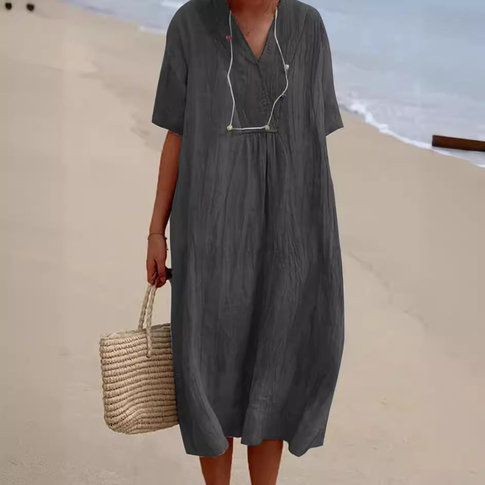 Dame afslappet strandkjole med dyb V-udskæring og løs silhuet Stilla