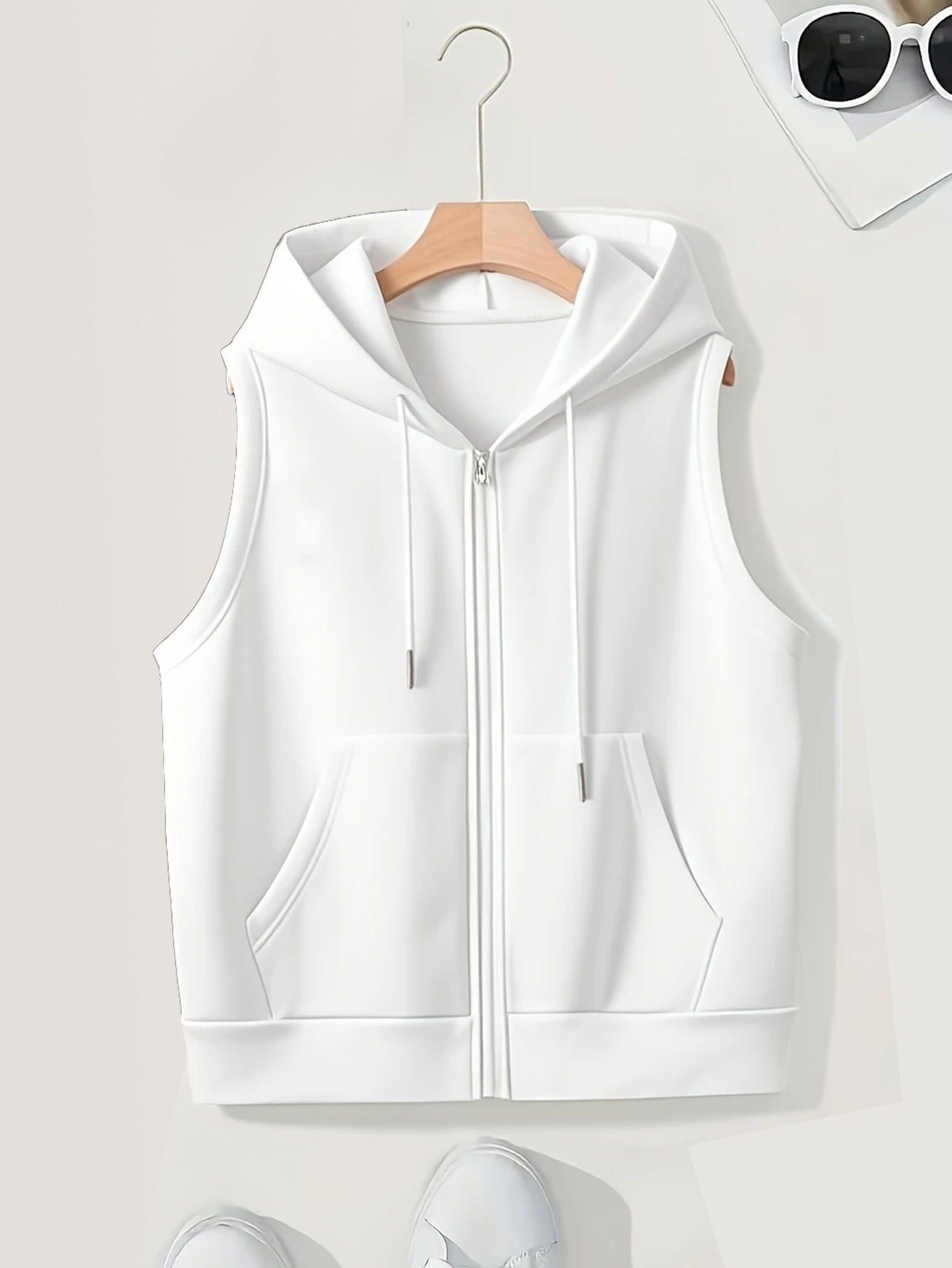 Dame sporty hættevest med gennemgående lynlås og praktiske lommer Stilla