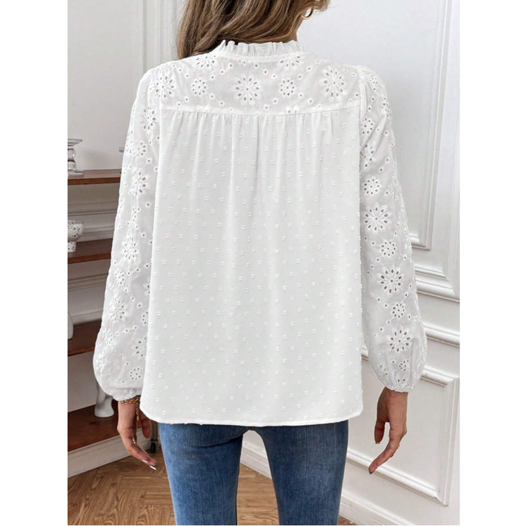 Dame elegant bluse med florale hulmønstre og pufærmer Stilla