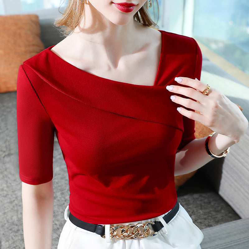 Dame Elegant top med asymmetrisk snit og feminin drapering Stilla