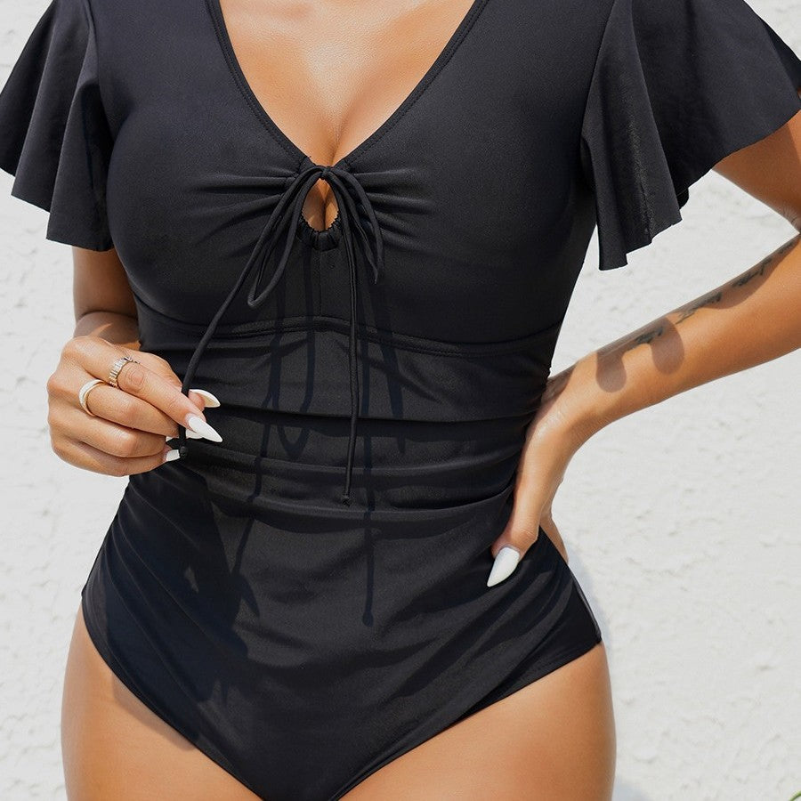 Dame elegant badedragt med vingerærmer og talje-knude detalje Stilla