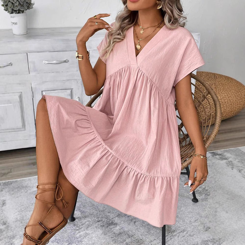 Dame afslappet sommerkjole med V-udskæring og voluminøs bund Stilla