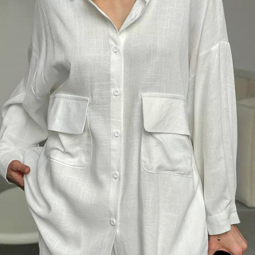 Dame afslappet bluse lavet af let hørstof med overliggende skuldre og knapdetaljer Stilla