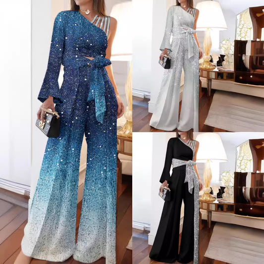 Dame elegant ensidig jumpsuit med glimmerdetaljer og bred ben Stilla