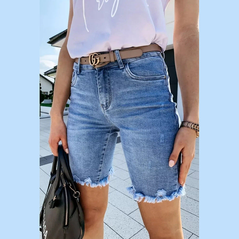 Dame jeans-shorts i moderne relaxed-fit stil med frynsekant Stilla