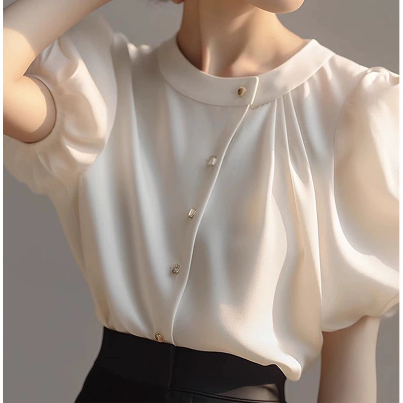 Dame elegant bluse med voluminøse ærmer og dekorative knapdetaljer Stilla