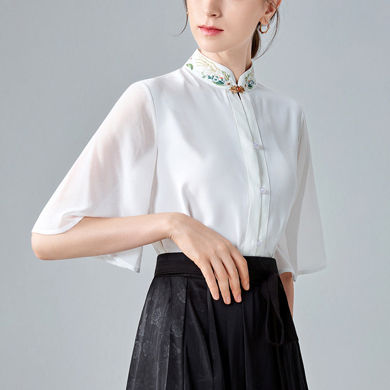 Dame elegant bluse med blomsterbroderier og gennemsigtige ærmer Stilla