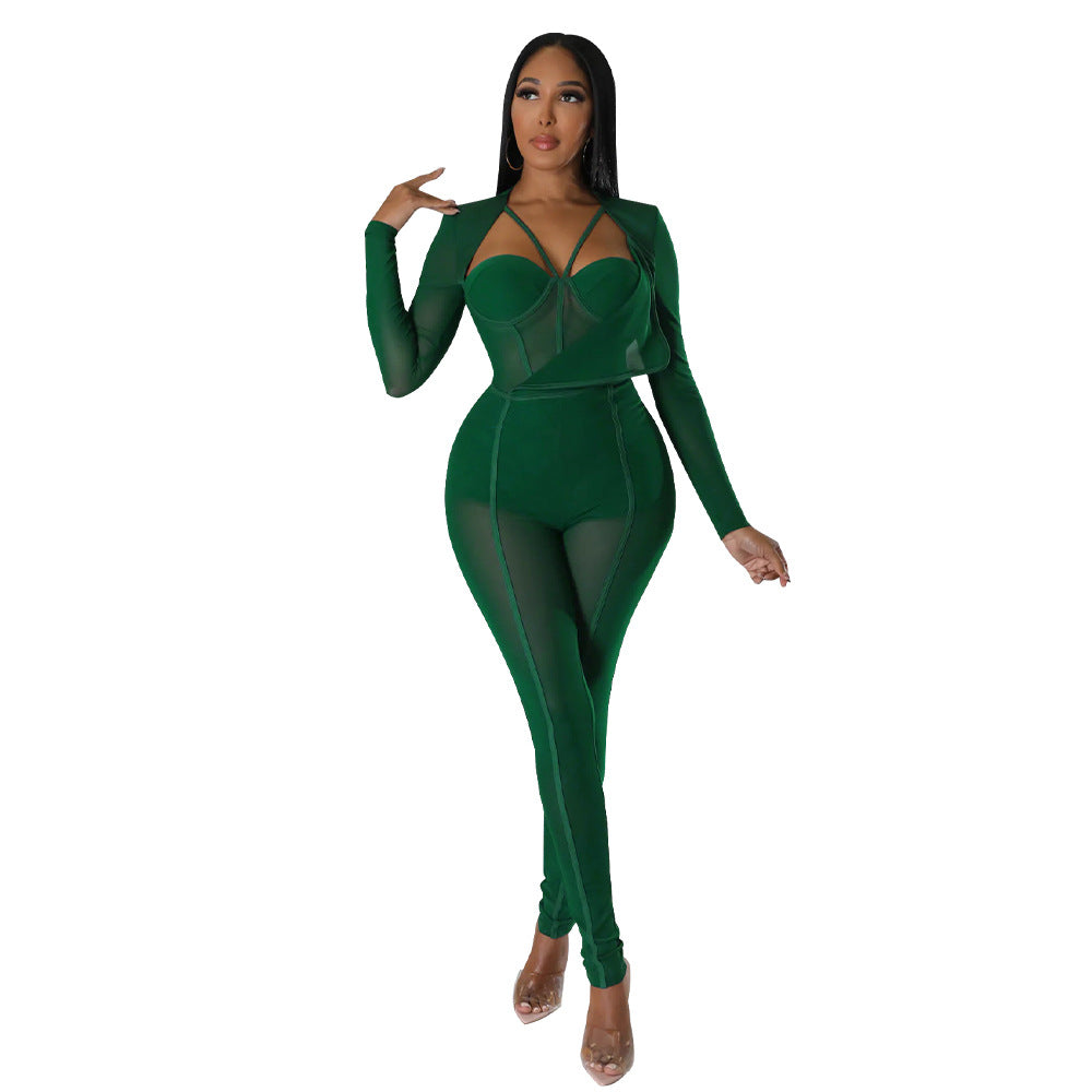 Dame figurtilpasset jumpsuit med innovative cut-out-designs og gennemsigtig stofstruktur Stilla