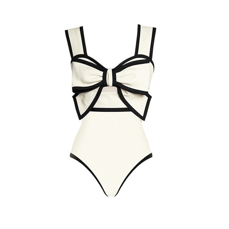 Dame badetøj sæt med elegant sløjfe-applikation og komfortabel nederdel Stilla