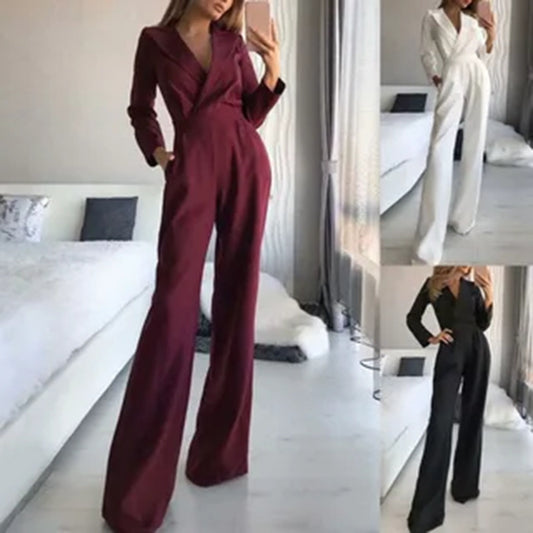 Dame jumpsuit i elegant businessstil med dyb V-hals og bredt ben Stilla